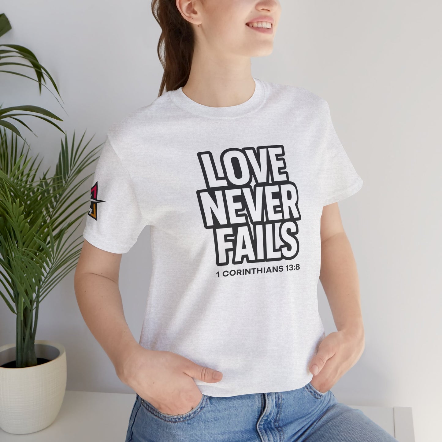 Love Never Fails Graphic T-Shirt | 1 Corinthians 13:8 Christian Tee | Faith & Love Streetwear