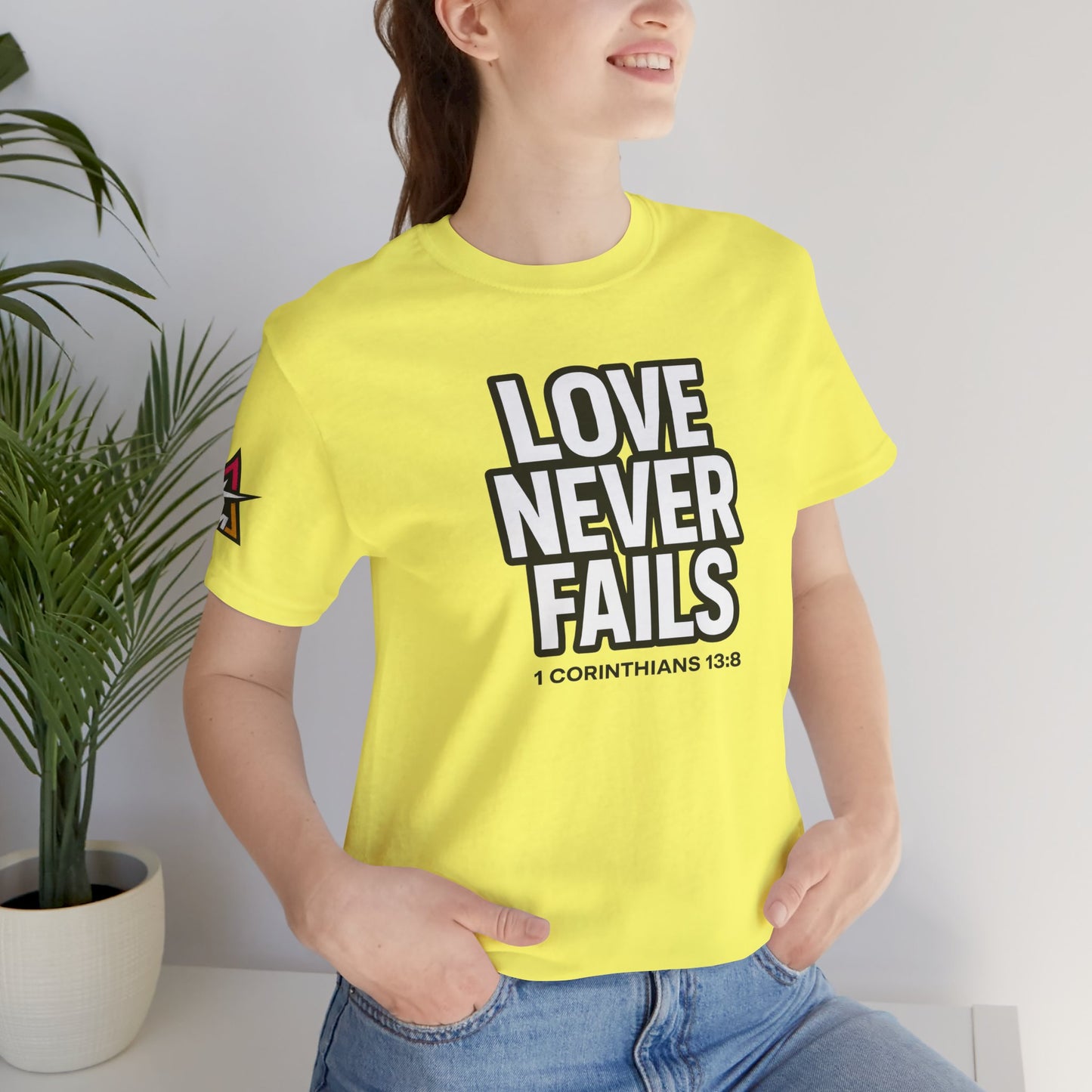 Love Never Fails Graphic T-Shirt | 1 Corinthians 13:8 Christian Tee | Faith & Love Streetwear