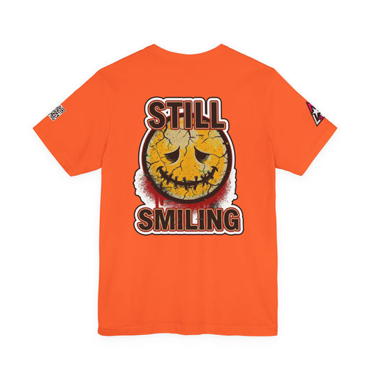 STILL SMILING Cracked Smile Graphic T-Shirt | Dark Humor Streetwear Tee | Distressed Smiley Shirt | Unisex Graphic Tee